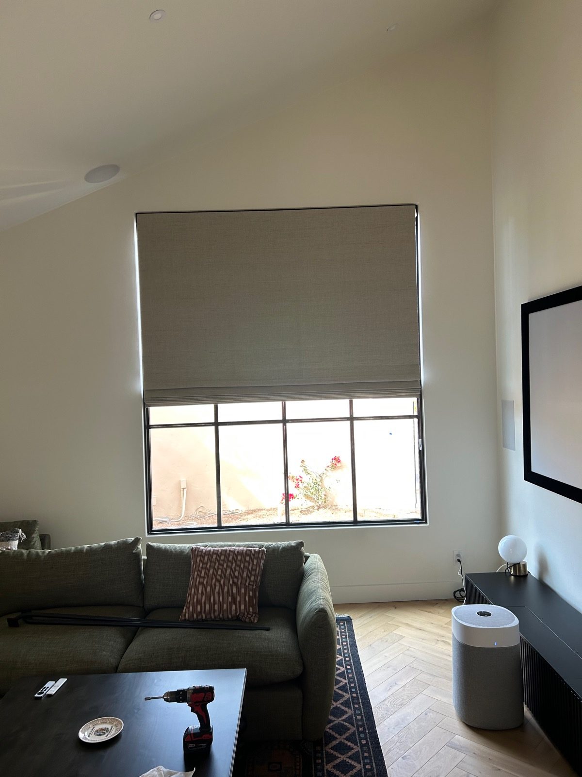 Room-darkening shade in a Tucson media room