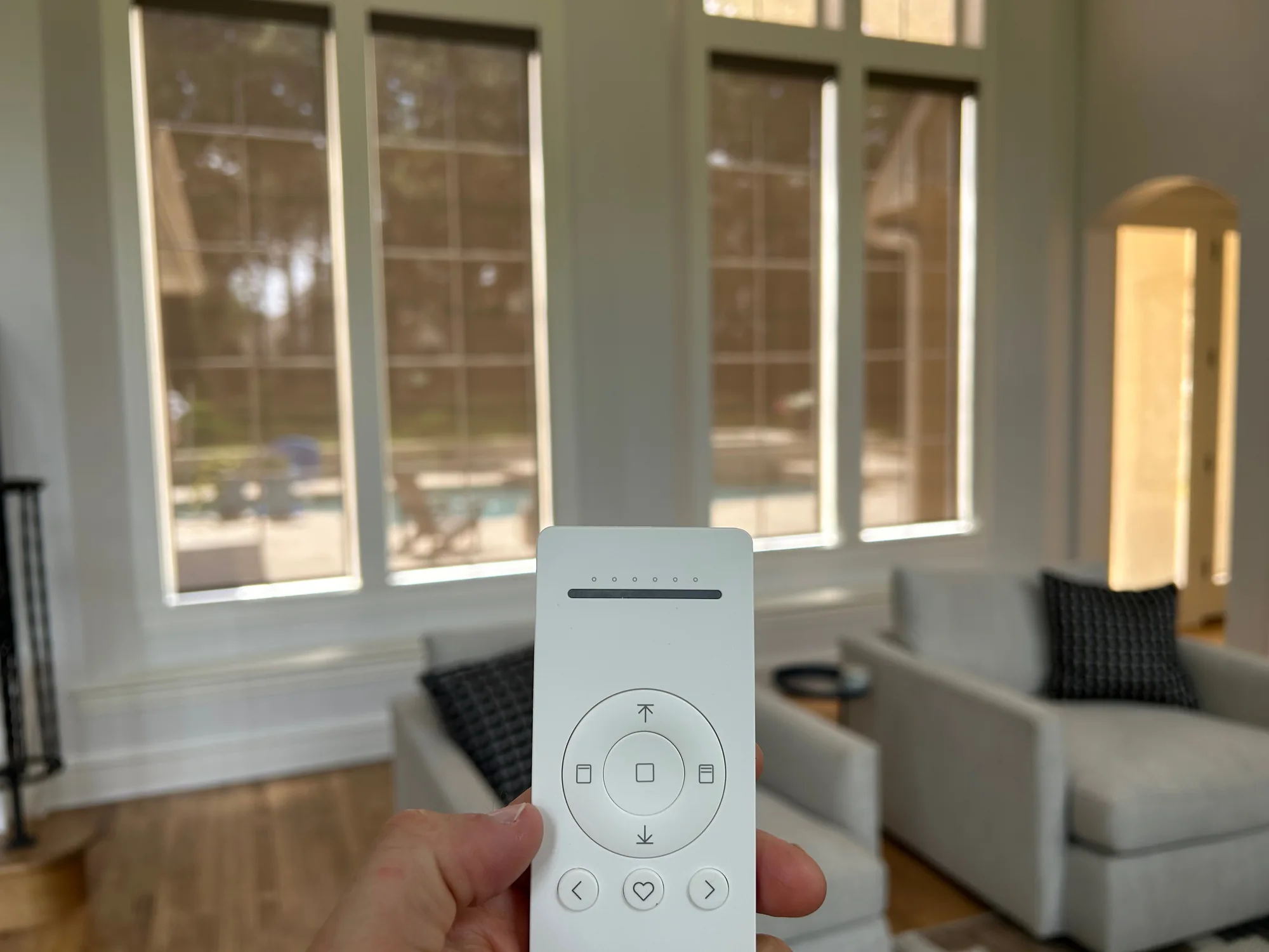 Motorized shades operated by remote, installed by Love Is Blinds