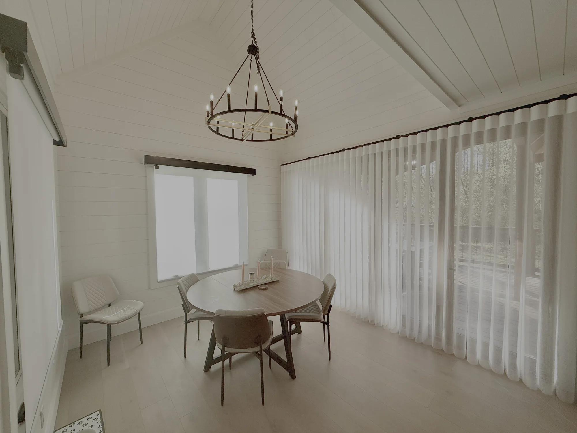 Floor-to-ceiling sheer drapery installed by Love Is Blinds